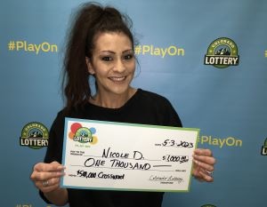 ¡Nicole D. de Littleton ganó $1,000 con su boleto Crossword Scratch de $500,000!