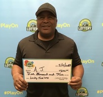 A.J. wins $5K on Lucky for Life ticket!