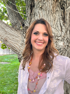 Commissioner Christian Reece - portrait outside in front of a tree